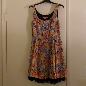 Floral mini dress with lace trimmed underskirt by Betsey Johnson.